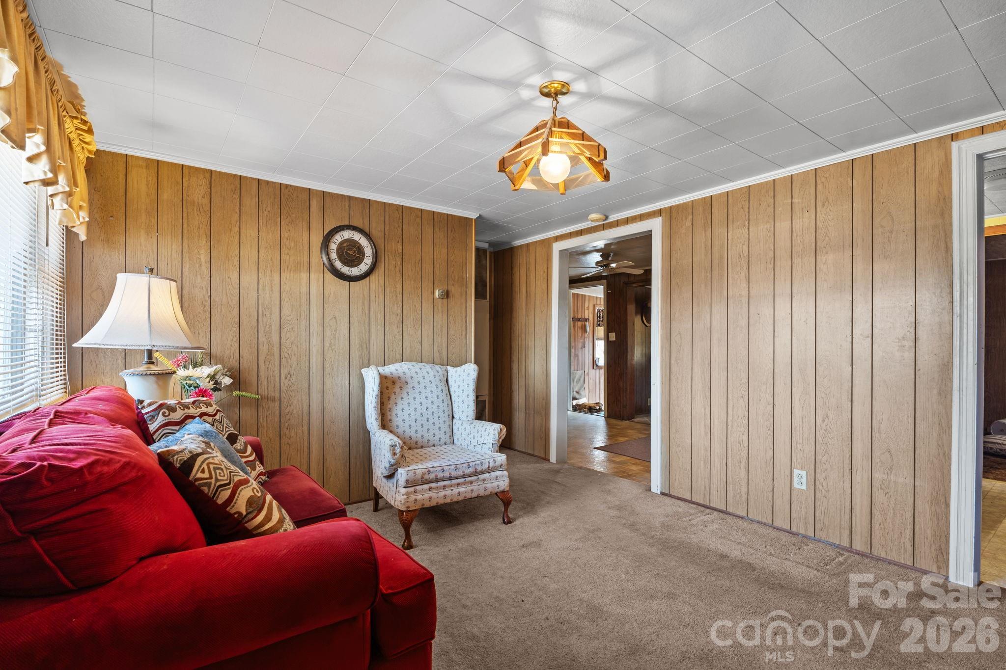 407 Conwell Road Pleasant Hill, NC 27866 - Photo 12 of 31 a living room with furniture and a window