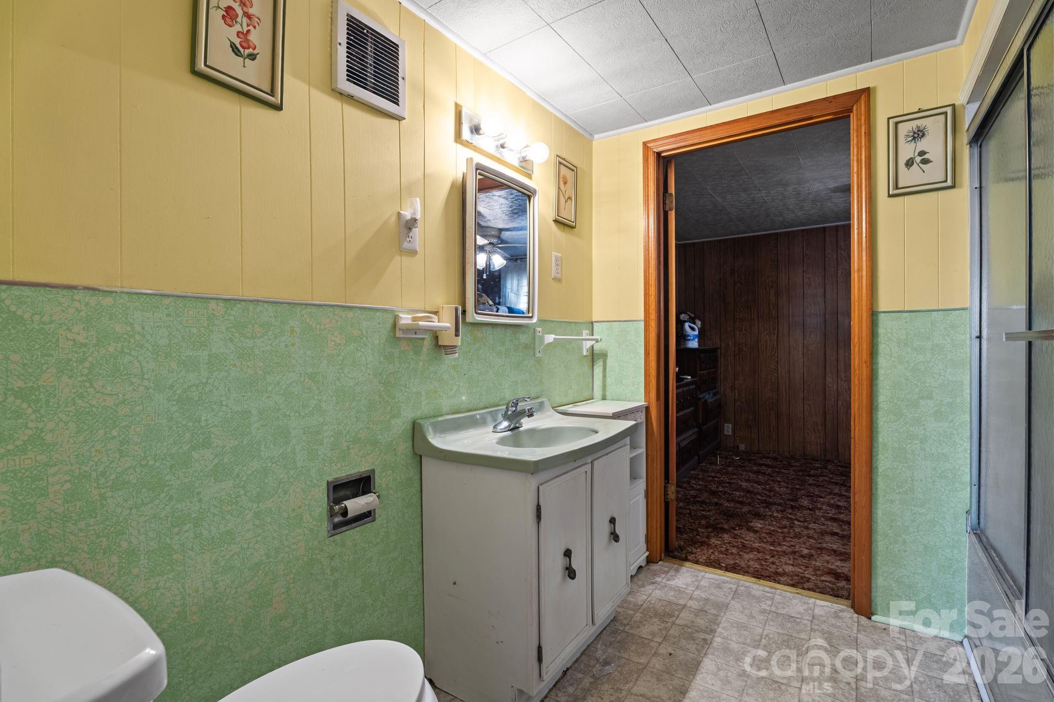 407 Conwell Road Pleasant Hill, NC 27866 - Photo 23 of 31 a bathroom with a sink toilet and shower