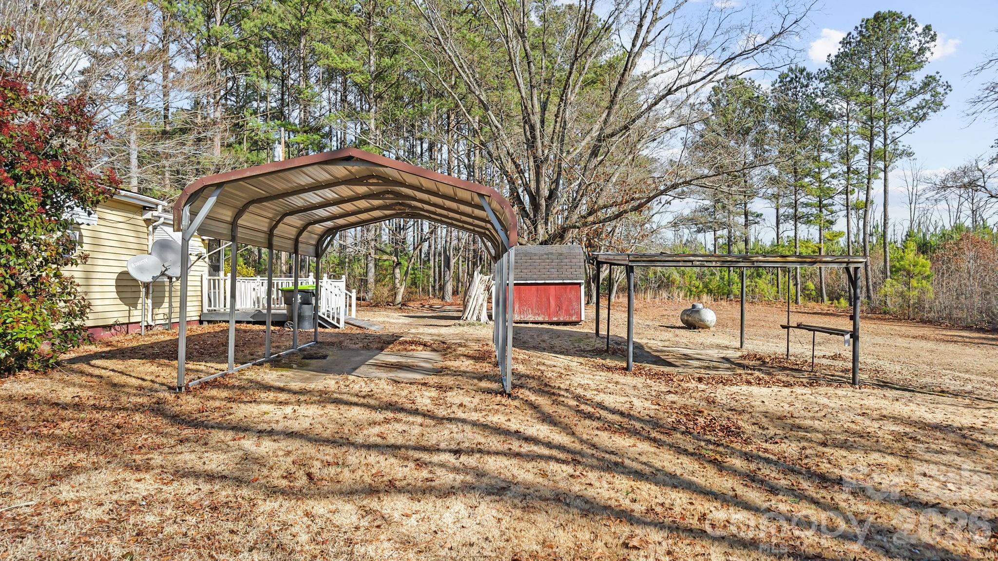 407 Conwell Road Pleasant Hill, NC 27866 - Photo 27 of 31 a view of a bench with wooden fence