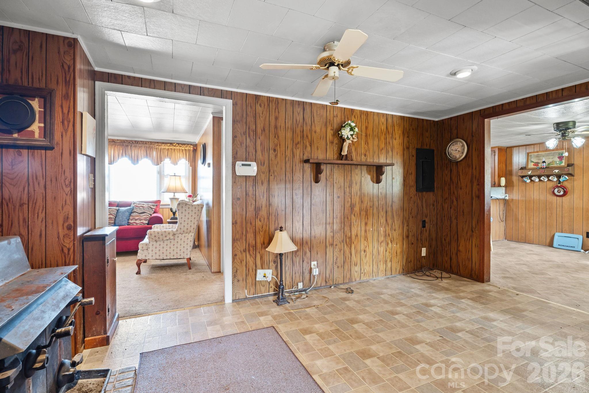 407 Conwell Road Pleasant Hill, NC 27866 - Photo 7 of 31 a view of a livingroom with furniture and a ceiling fan