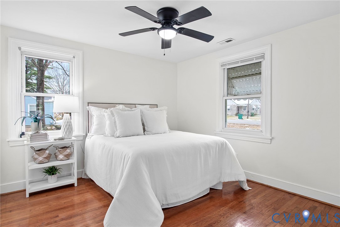 609 Woodstock Road Richmond, VA 23224 - Photo 17 of 33 a bedroom with a bed and a window