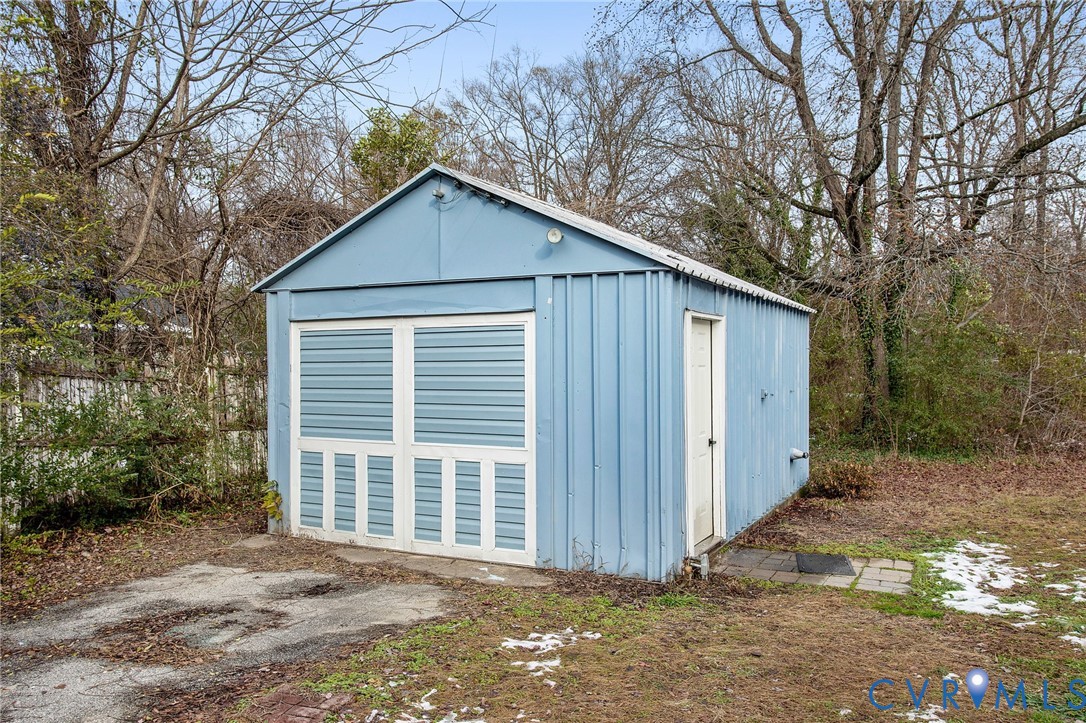 609 Woodstock Road Richmond, VA 23224 - Photo 29 of 33 a view of a house with a yard