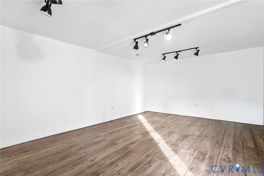 609 Woodstock Road Richmond, VA 23224 - Photo 30 of 33 a view of a room with wooden floor