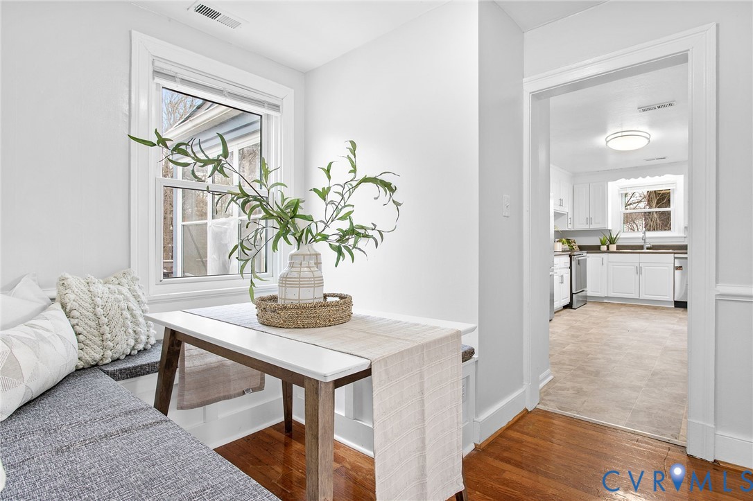 609 Woodstock Road Richmond, VA 23224 - Photo 10 of 33 a living room with furniture and a table