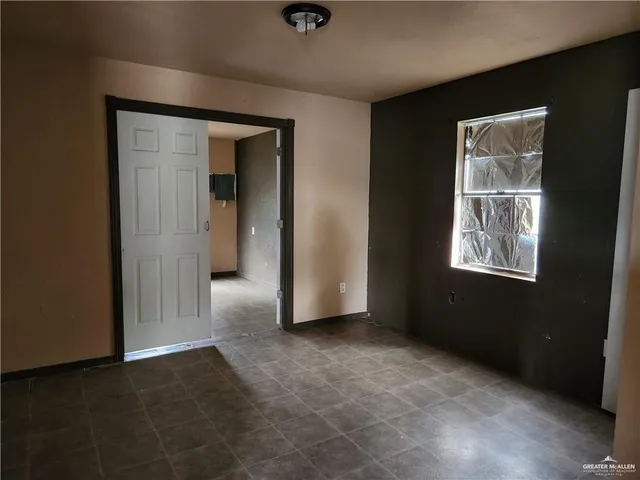 an empty room with windows