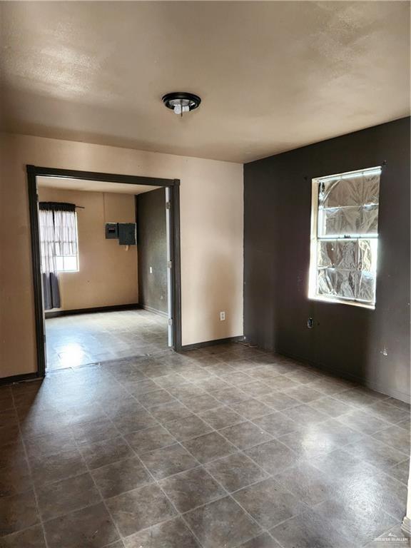 2981 Azalea Street Roma, TX 78584 - Photo 7 of 15 an empty room with windows