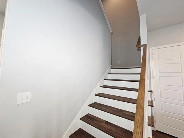 a view of entryway with wooden floor