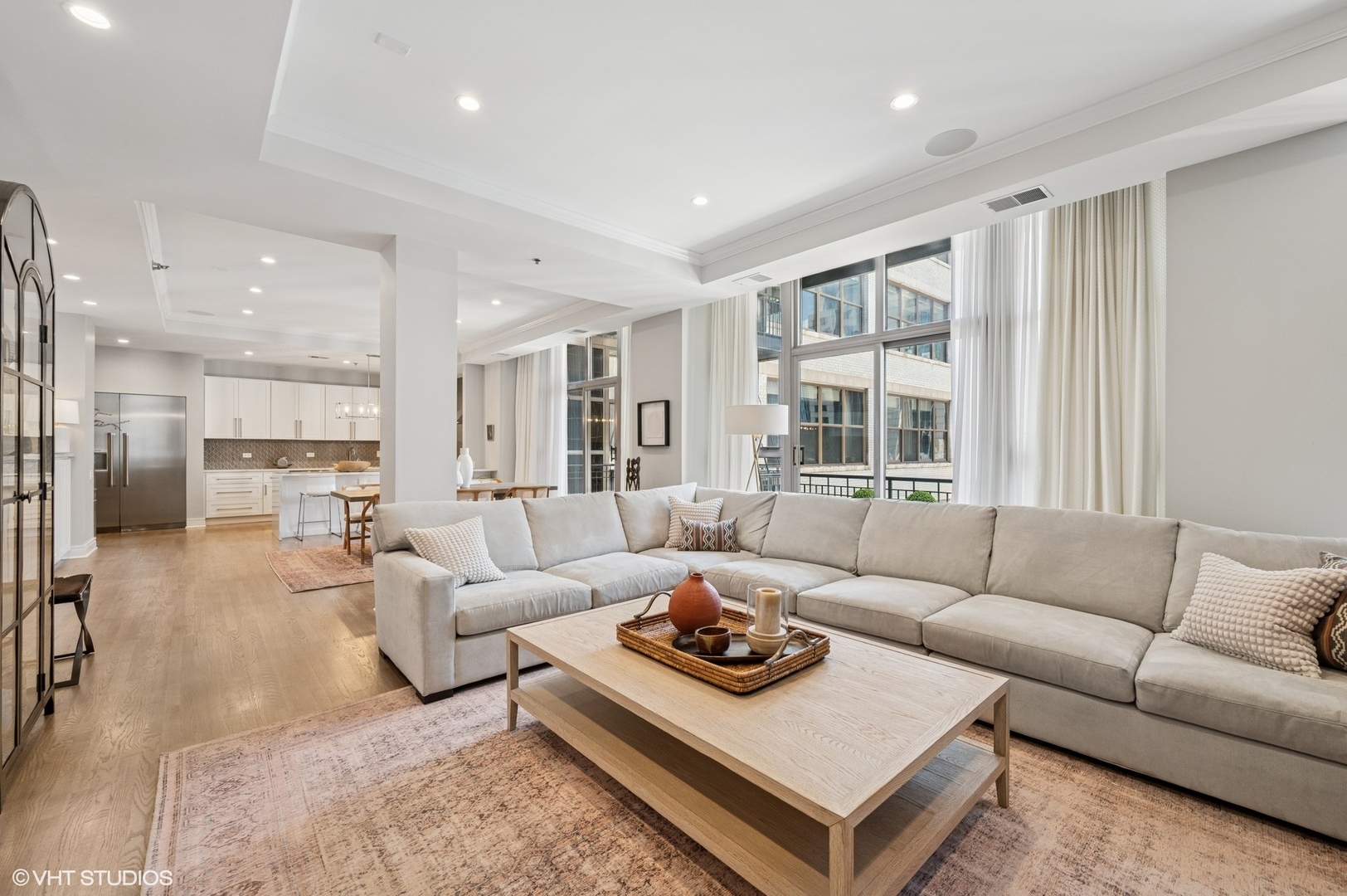212 West Washington Street, Unit 1807 Chicago, IL 60606 - Photo 5 of 24 a living room with furniture and a large window