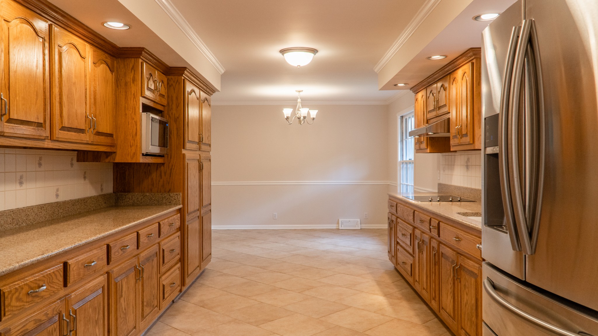 809 Berwick Trail Madison, TN 37115 - Photo 18 of 34 a kitchen with stainless steel appliances granite countertop a refrigerator and a stove