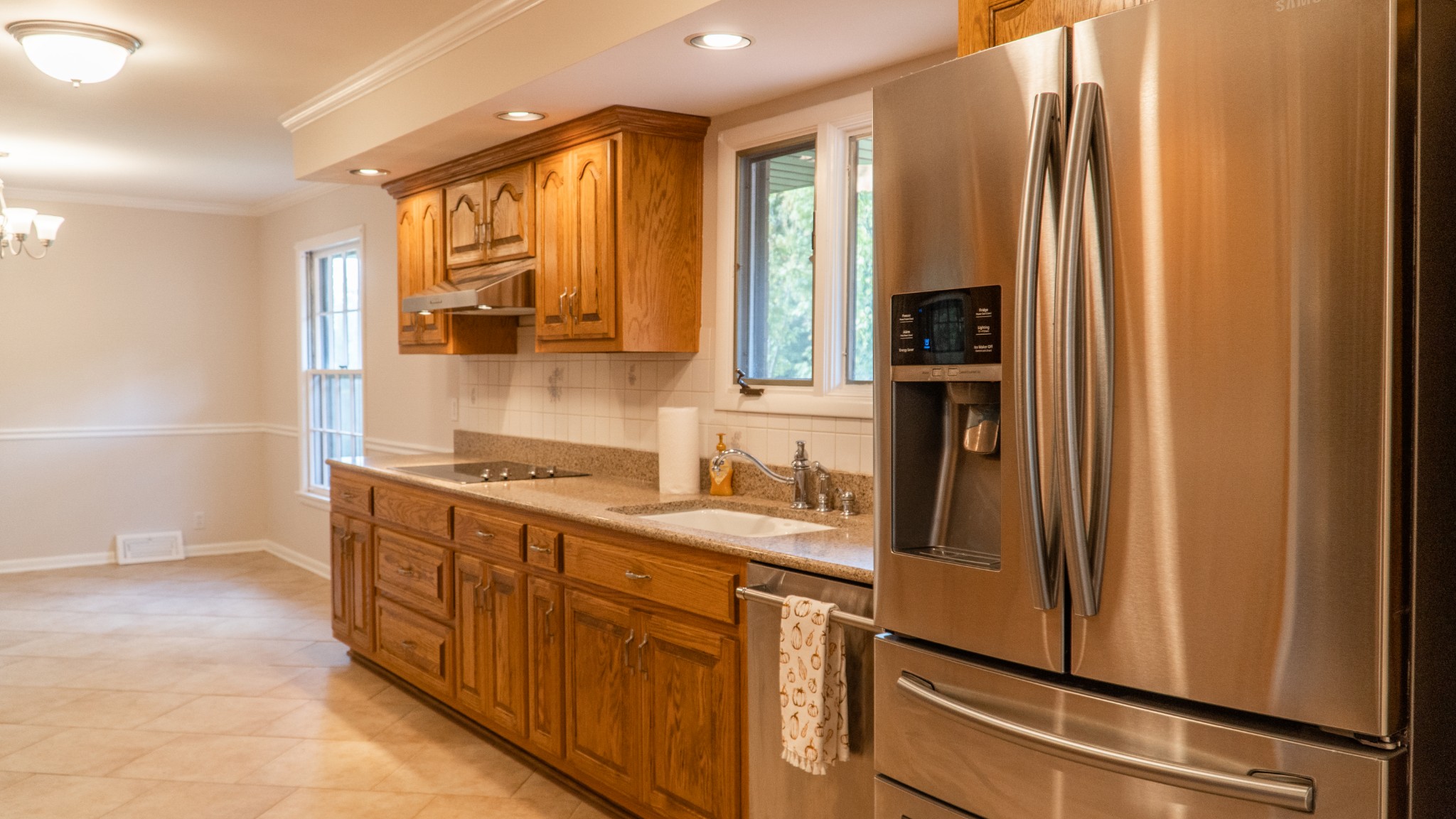 809 Berwick Trail Madison, TN 37115 - Photo 20 of 34 a kitchen with stainless steel appliances a sink stove and a refrigerator