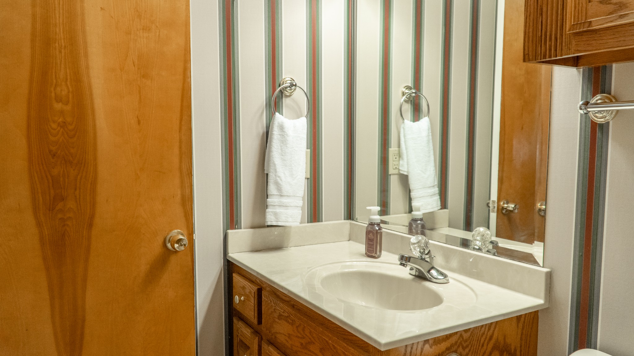 809 Berwick Trail Madison, TN 37115 - Photo 26 of 34 a bathroom with a sink and a mirror