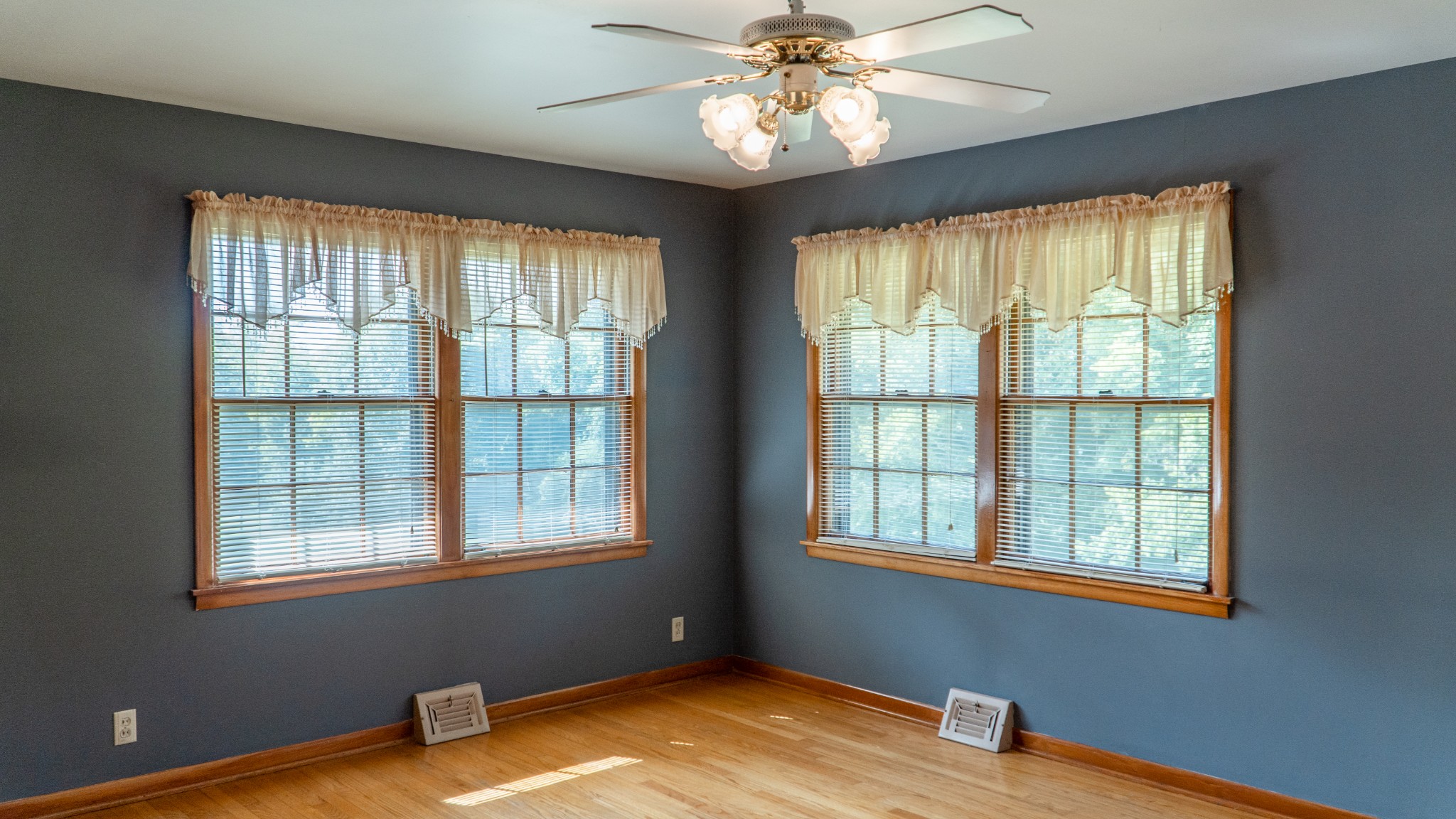 809 Berwick Trail Madison, TN 37115 - Photo 29 of 34 a view of an empty room with a window and wooden floor