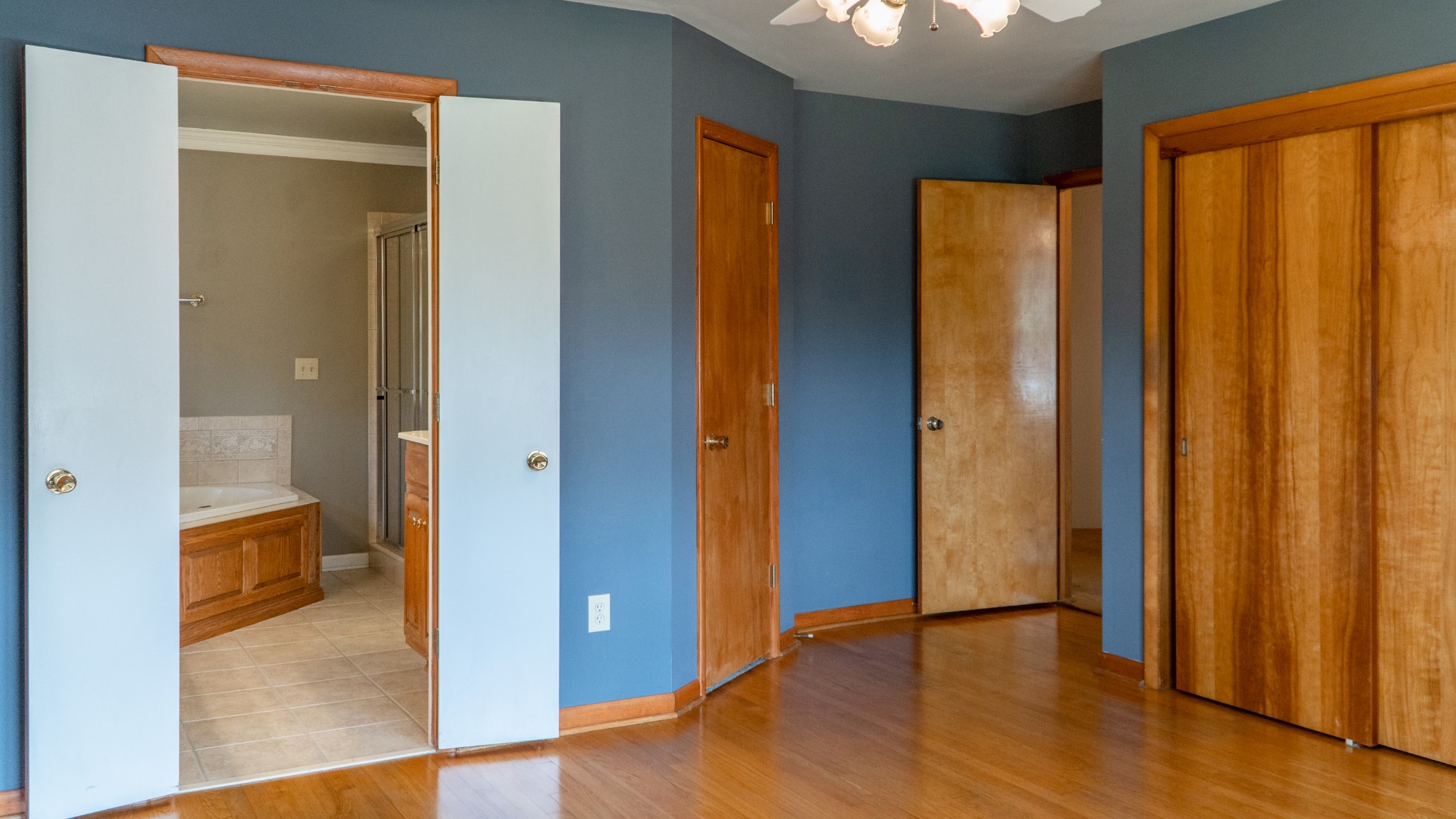 809 Berwick Trail Madison, TN 37115 - Photo 30 of 34 a view of an empty room with wooden floor and a window