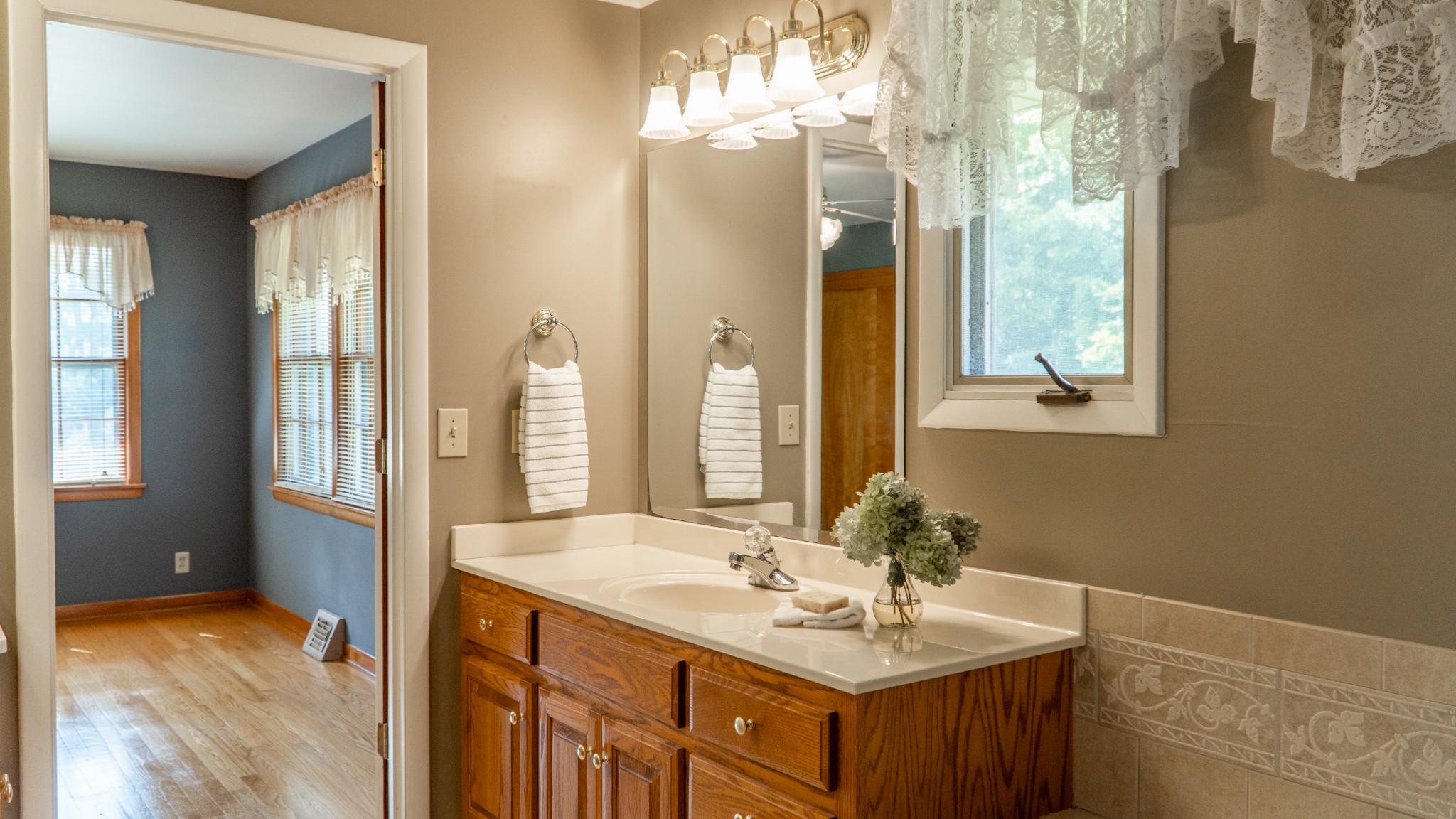 809 Berwick Trail Madison, TN 37115 - Photo 33 of 34 a bathroom with a sink double vanity and a mirror