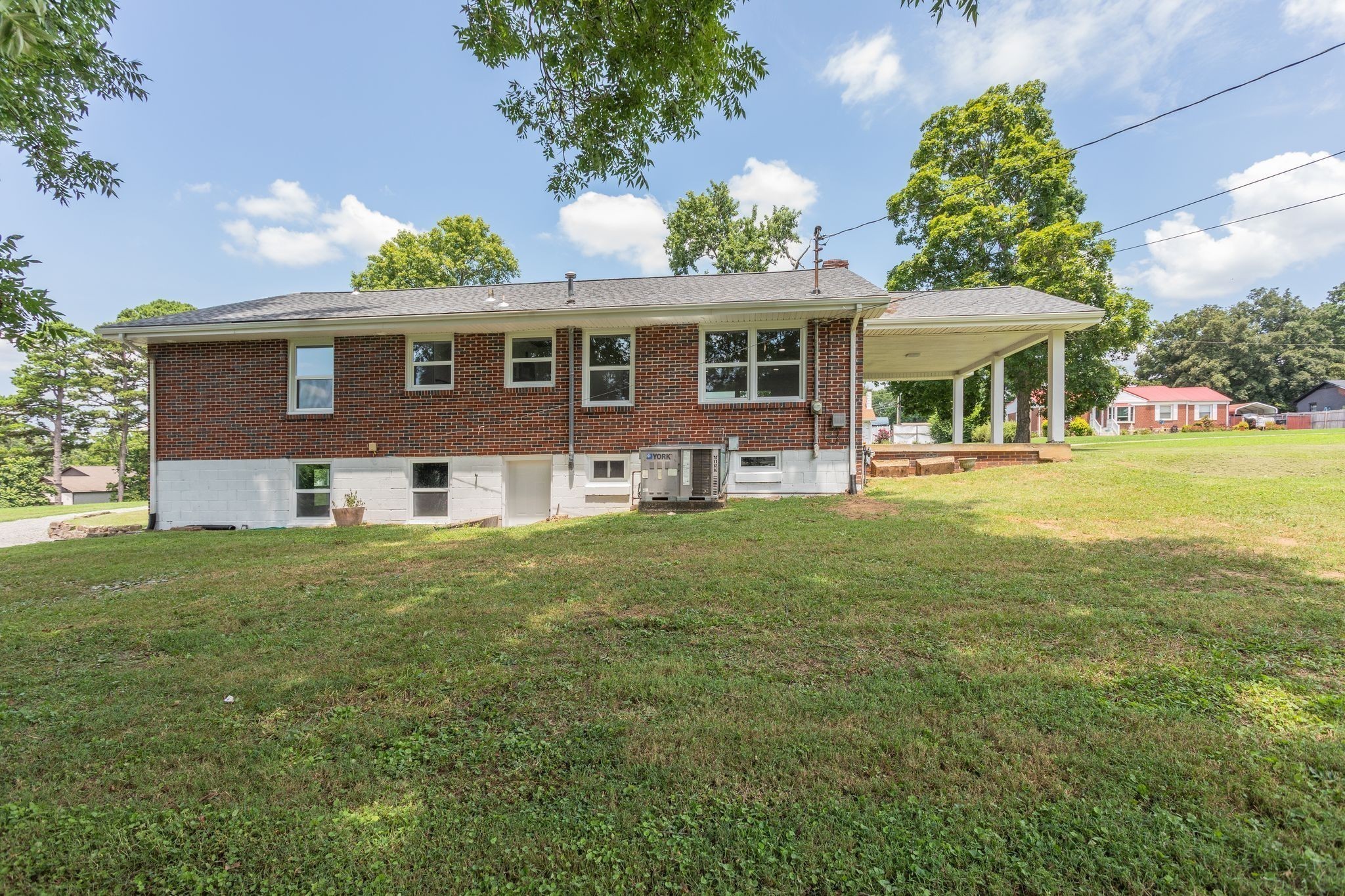 210 Porter Circle Columbia, TN 38401 - Photo 23 of 29 a front view of a house with a garden