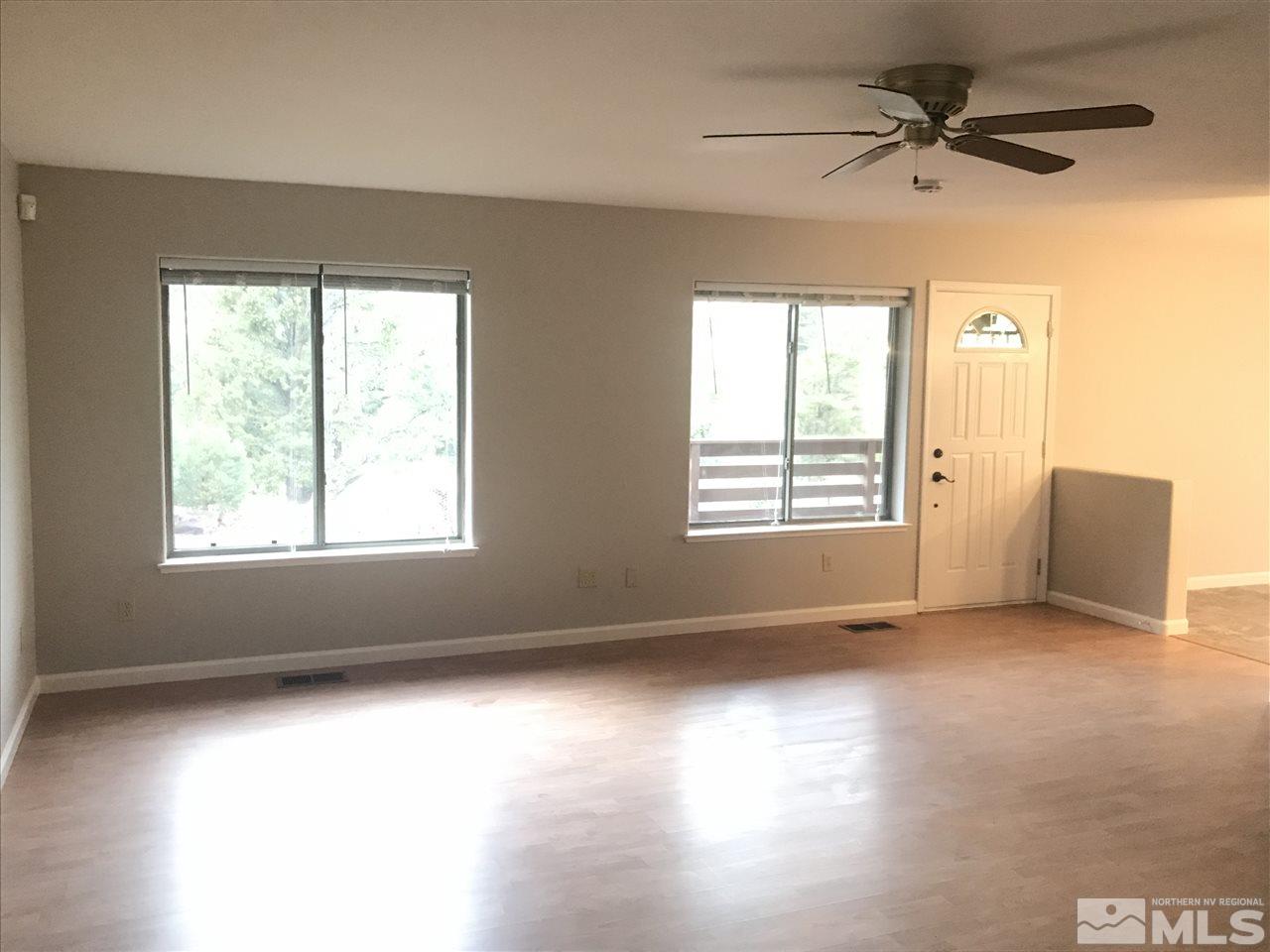 750 Buckeye Road Reno, NV 89521 - Photo 3 of 19 a view of an empty room with a window