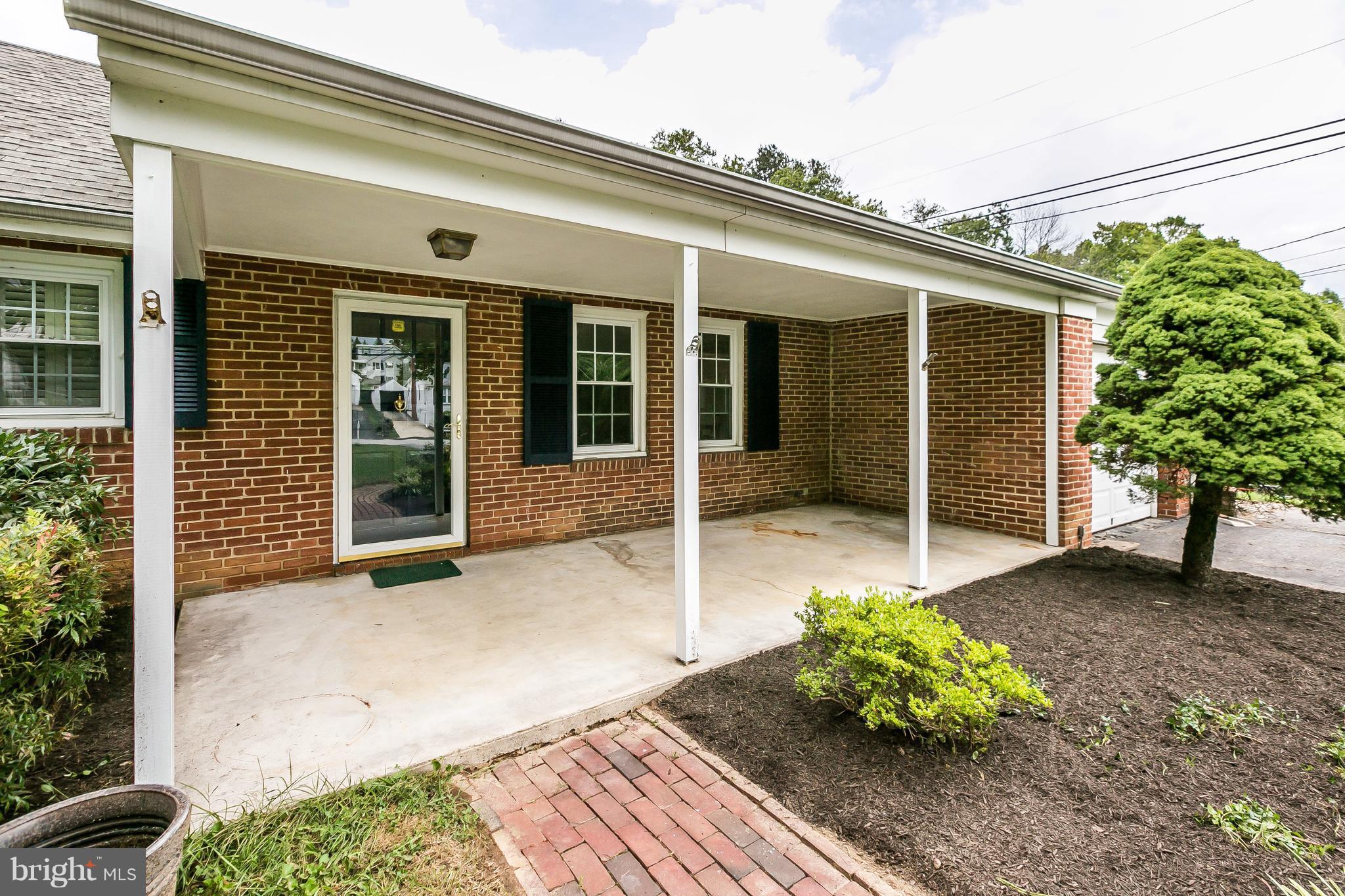 1804 Roland Avenue Towson, MD 21204 - Photo 2 of 30 Enjoy large flat front yard from covered porch