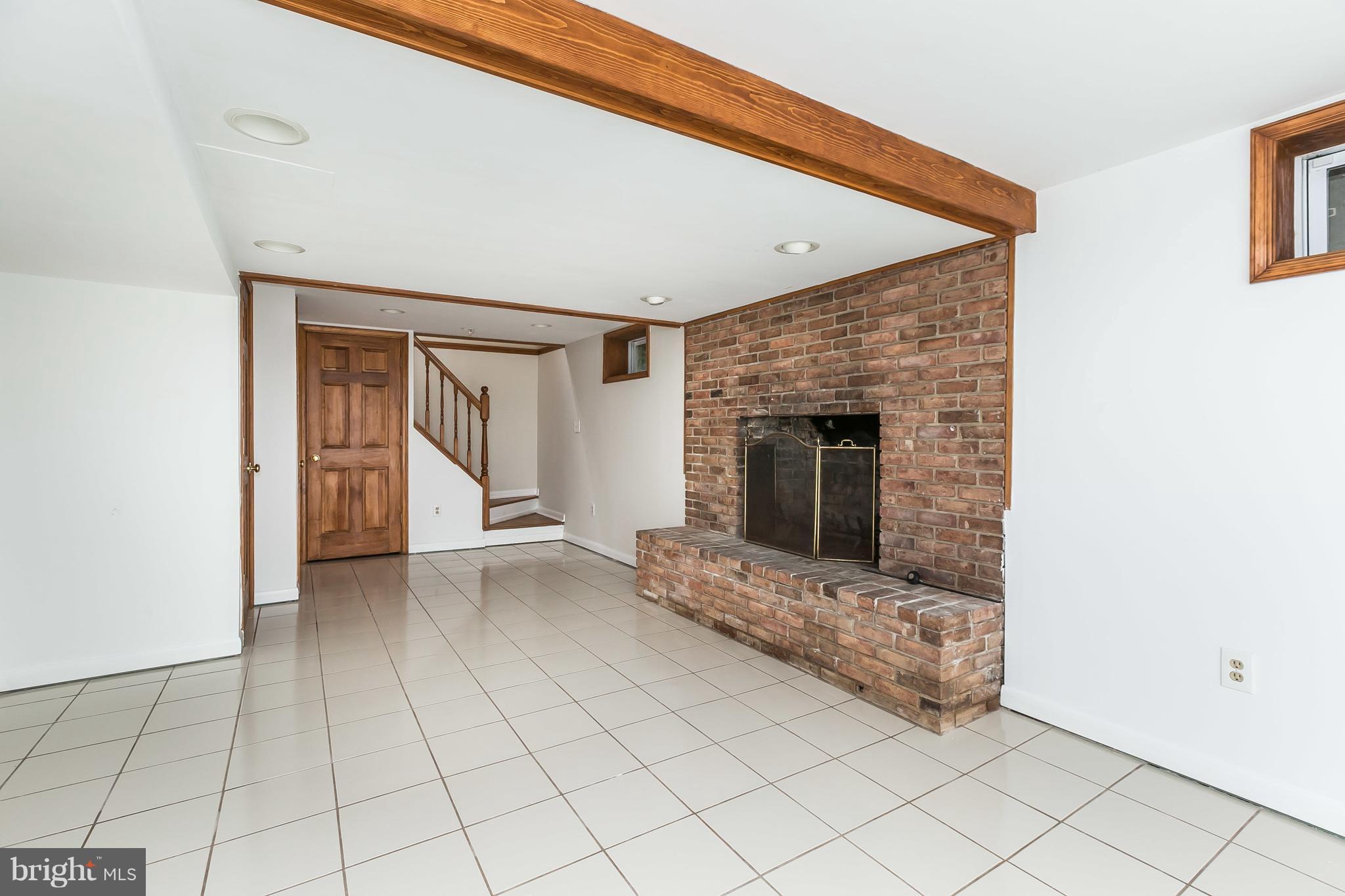 1804 Roland Avenue Towson, MD 21204 - Photo 21 of 30 Family Room w/ wood-burning freplace