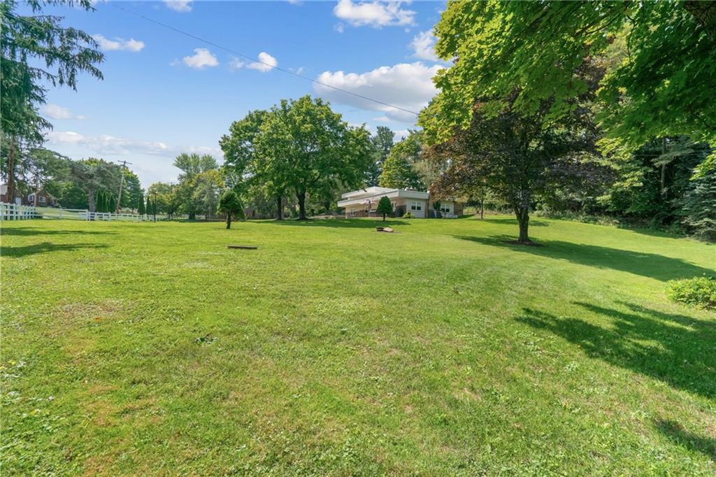 124 McBride Hill Road Butler, PA 16002 - Photo 13 of 41 a view of a big yard with a house