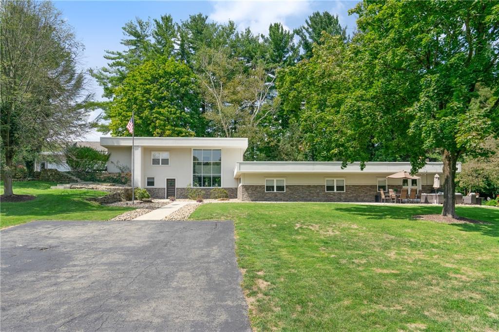 124 McBride Hill Road Butler, PA 16002 - Photo 3 of 41 a house view with a garden space