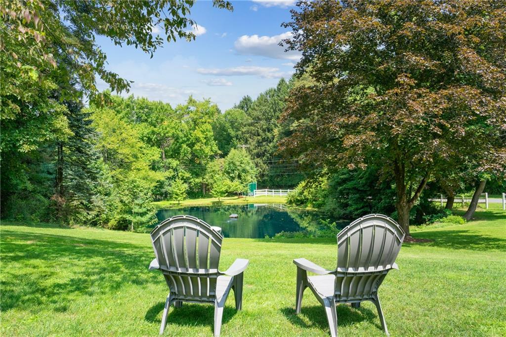 124 McBride Hill Road Butler, PA 16002 - Photo 41 of 41 a backyard of a house with table and chairs