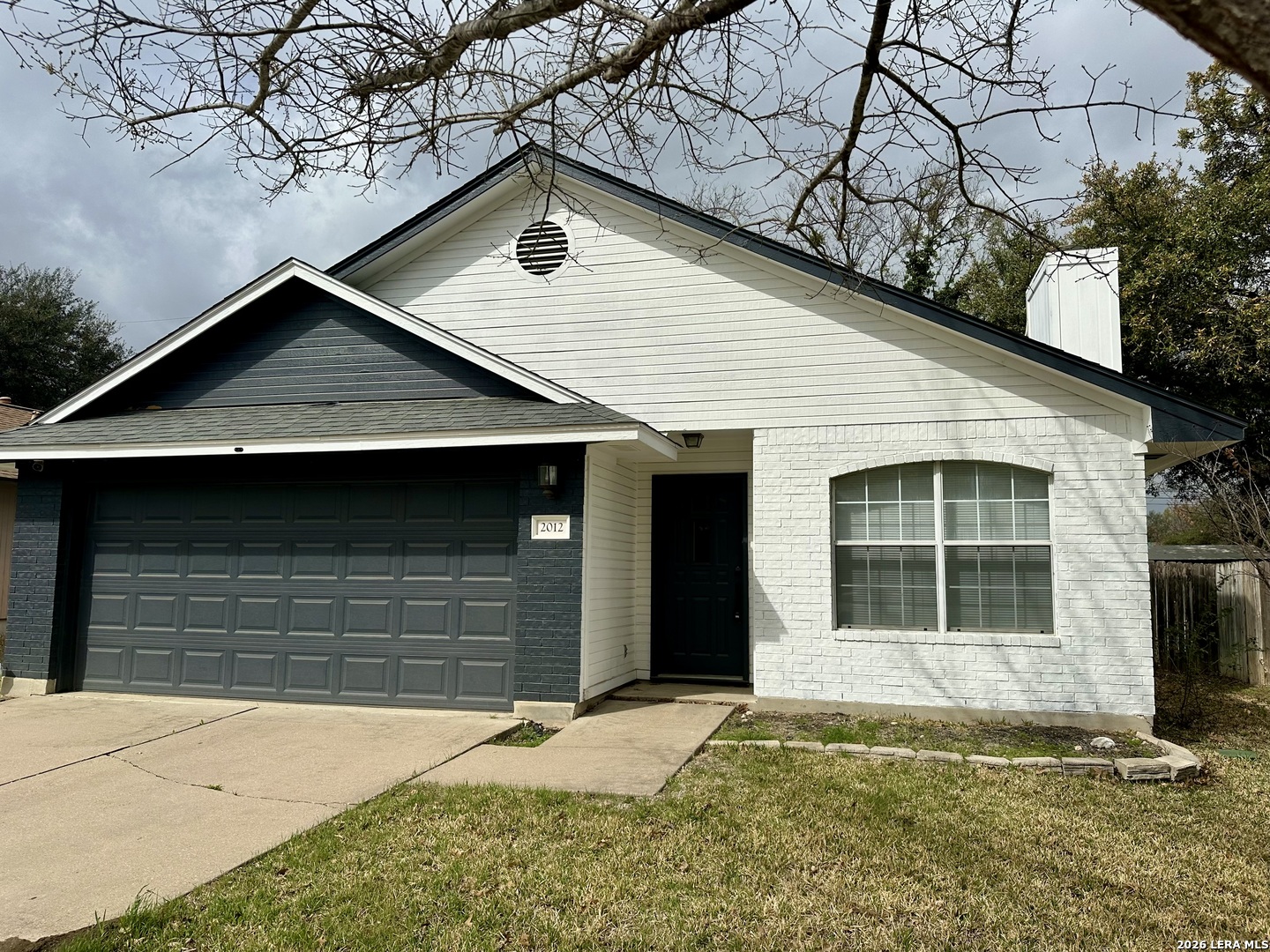 2012 Balsam Way Round Rock, TX 78665 - Photo 1 of 20 a front view of a house with a yard and garage