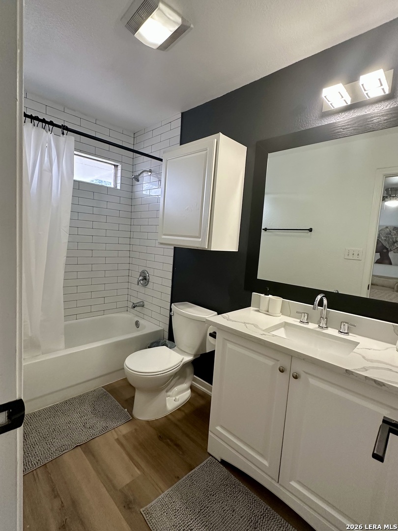 2012 Balsam Way Round Rock, TX 78665 - Photo 14 of 20 a bathroom with a sink toilet and shower