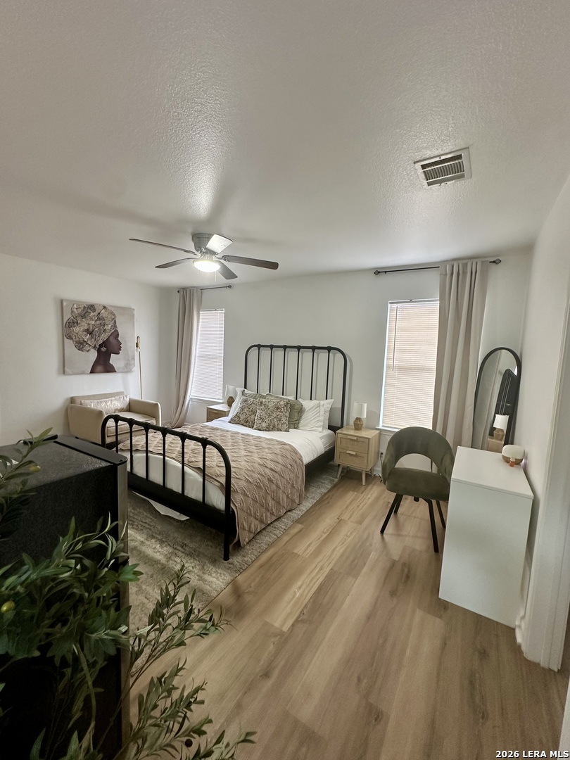 2012 Balsam Way Round Rock, TX 78665 - Photo 16 of 20 a bedroom with furniture and a window