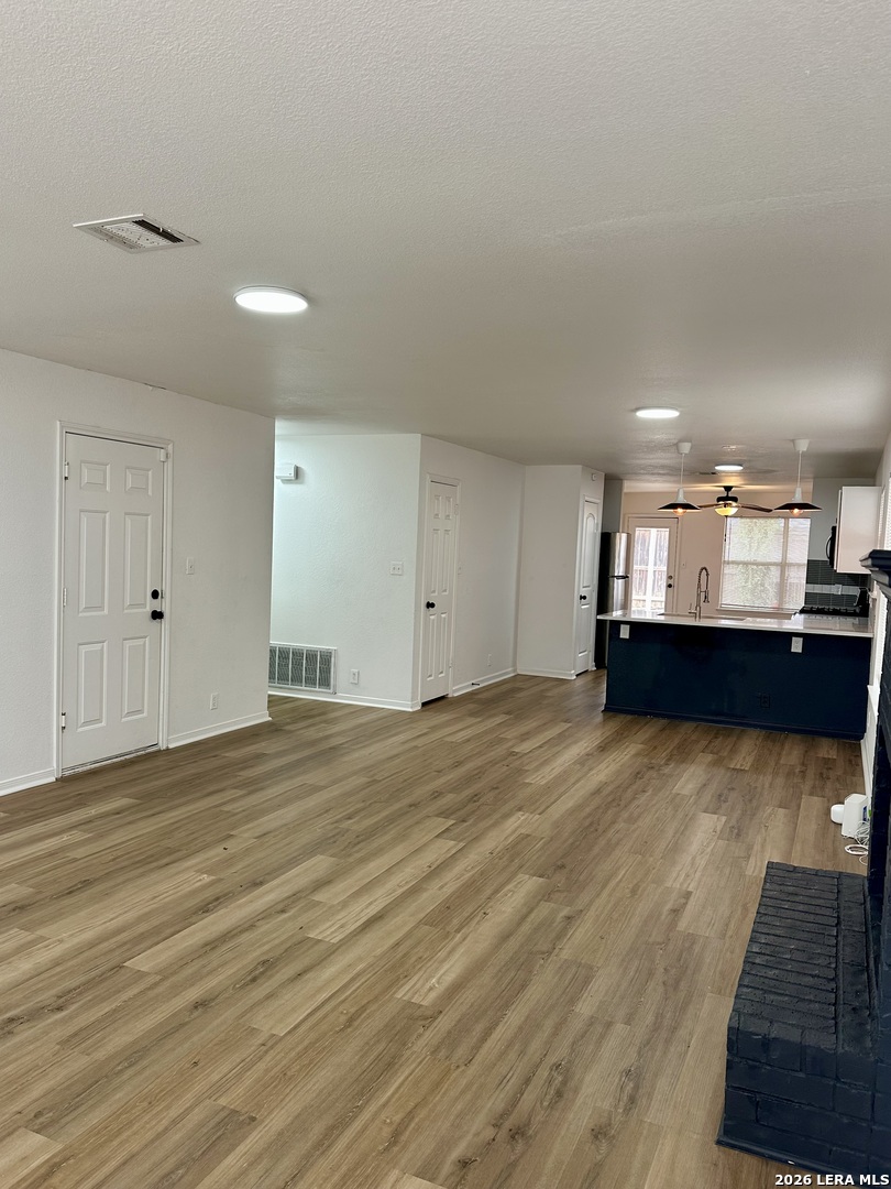 2012 Balsam Way Round Rock, TX 78665 - Photo 5 of 20 a view of kitchen and wooden floor