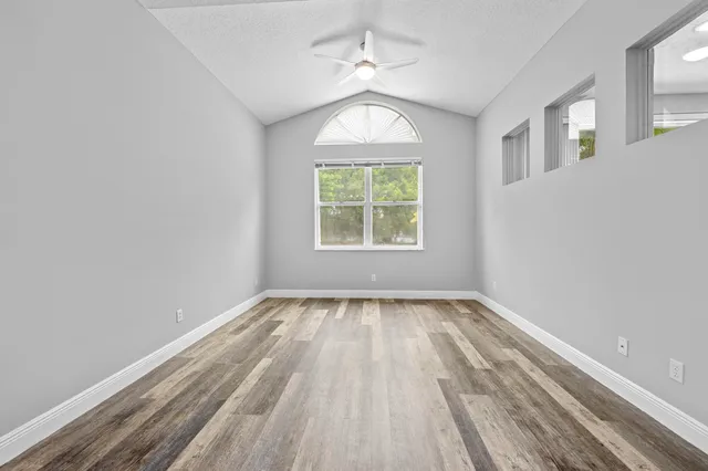 a view of an empty room with a window