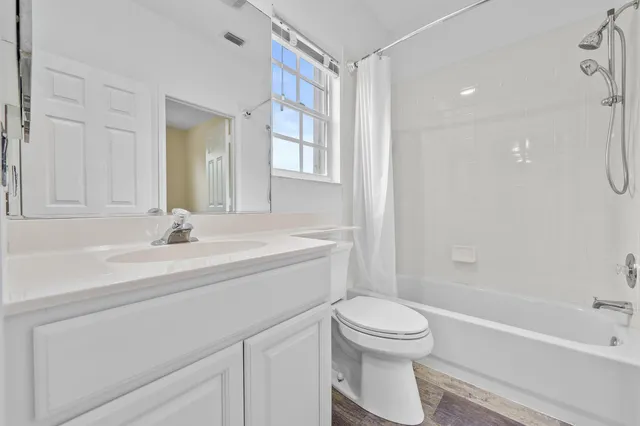 a view of an empty room and a gallery