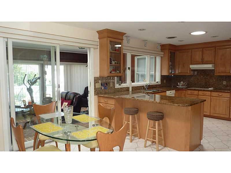 177 Rangeley Road Cranston, RI 02920 - Photo 8 of 22 Updated Kitchen leading into Florida Room~