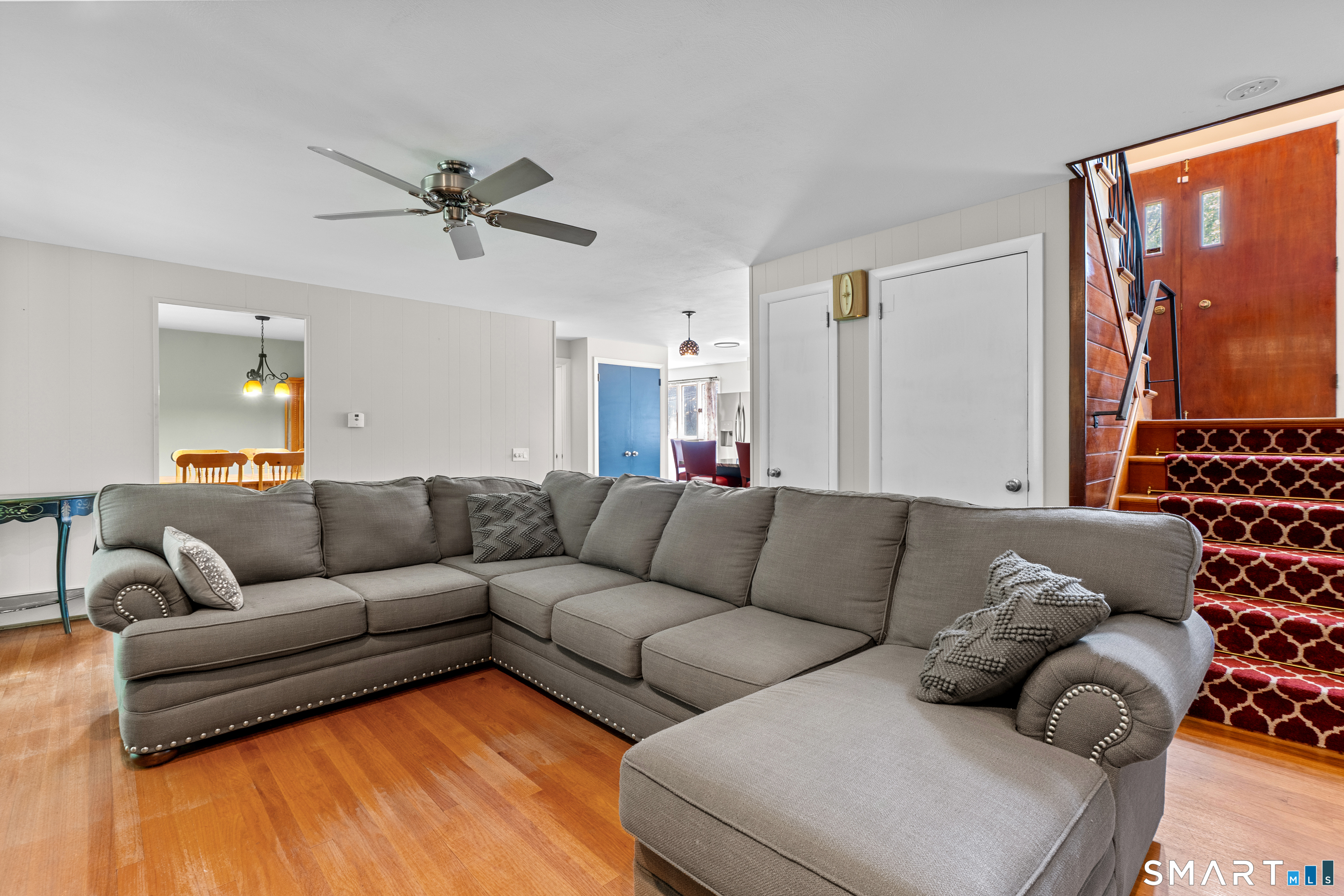 107 Round Hill Road Wethersfield, CT 06109 - Photo 9 of 40 a living room with furniture and a large window