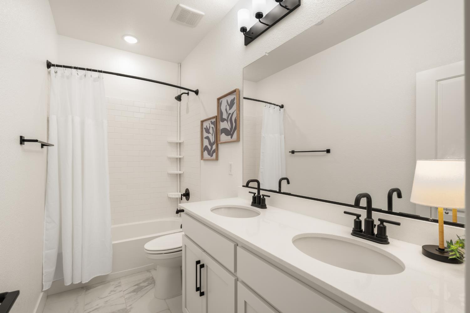 4216 Creede Way Rancho Cordova, CA 95742 - Photo 34 of 56 a bathroom with a sink toilet and shower