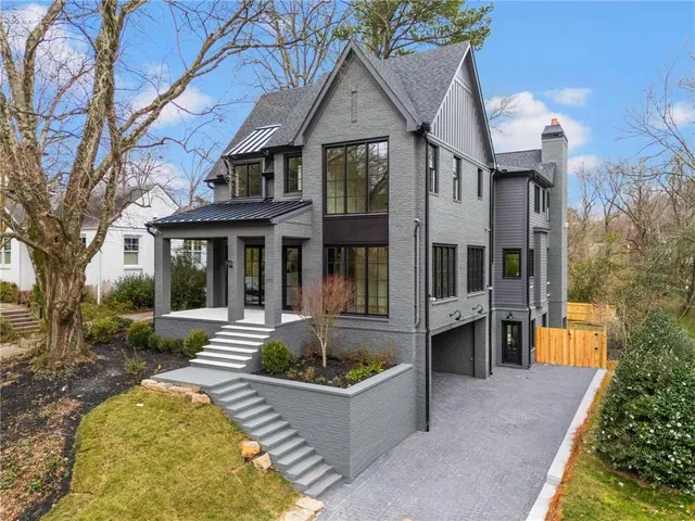 front view of a house with a swimming pool