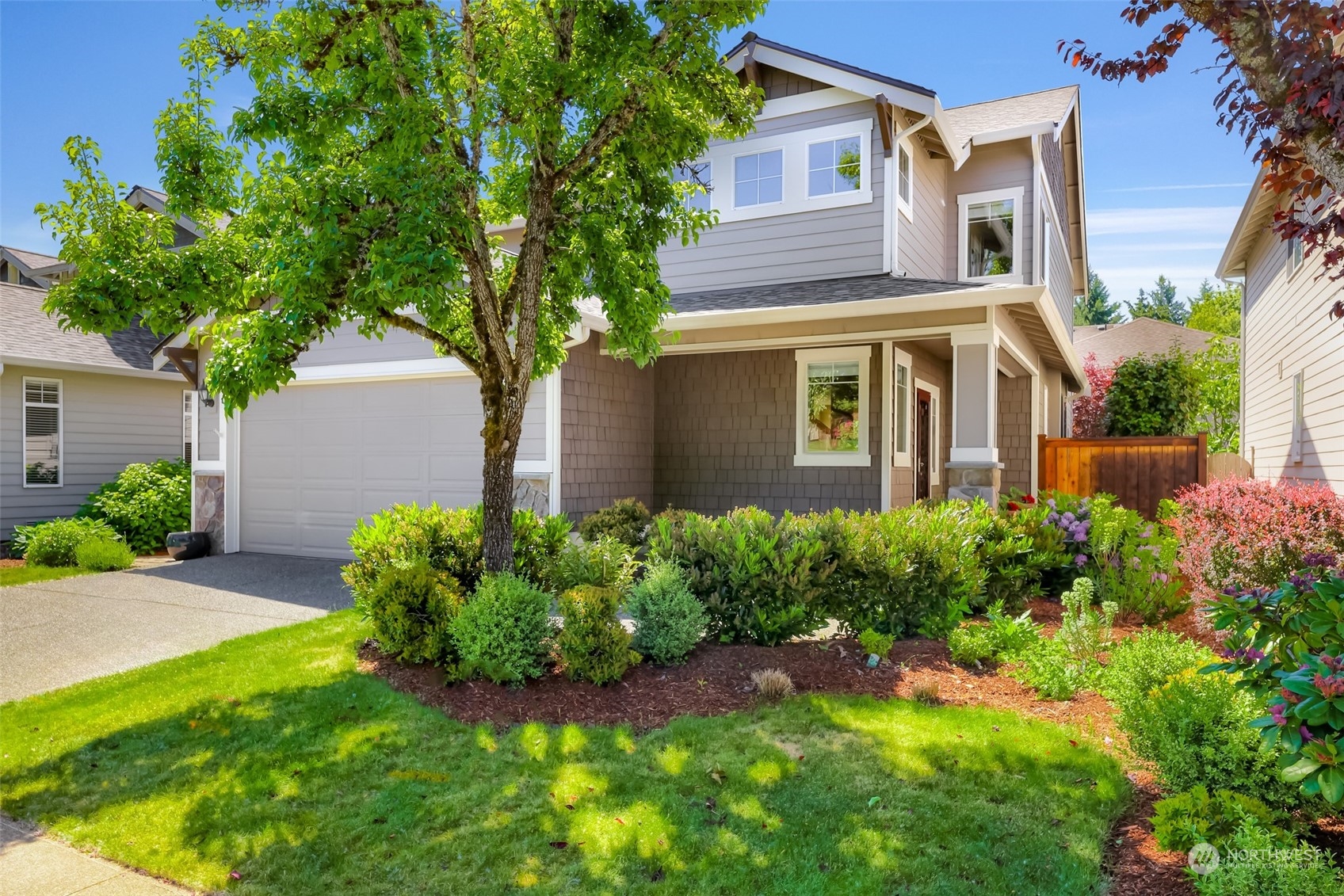 5907 Southeast 2nd Street Renton, WA 98059 - Photo 1 of 40 front view of a house with a yard