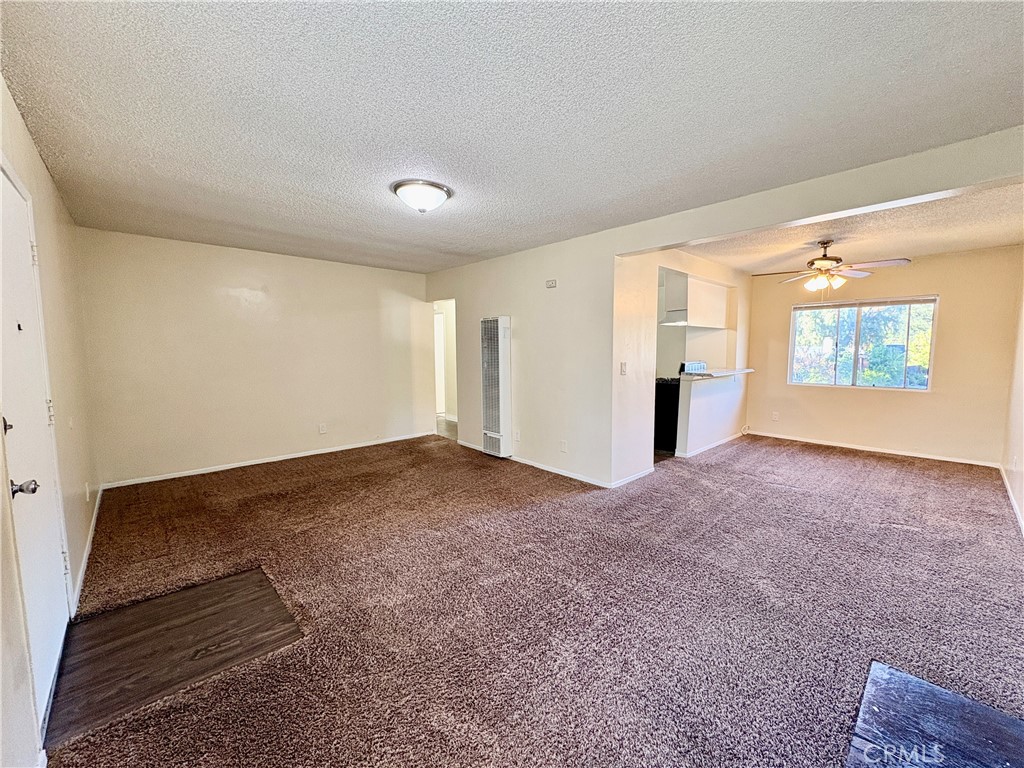 144 West Baseline Road, Unit 7 San Dimas, CA 91773 - Photo 2 of 11 a view of an empty room and window