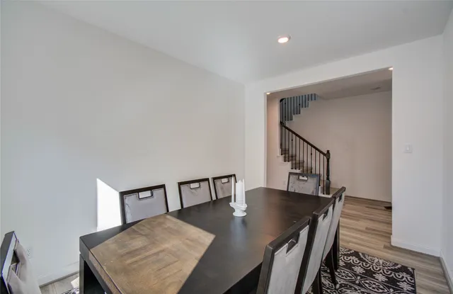 a view of a dining room with furniture