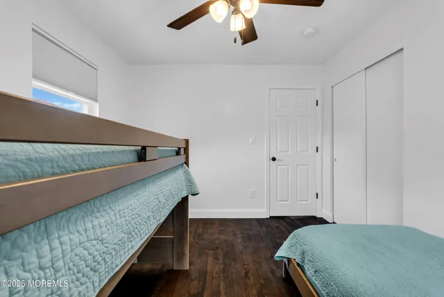 a view of bedroom and bedroom with furniture