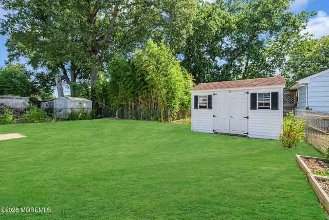 a view of a backyard with a garden