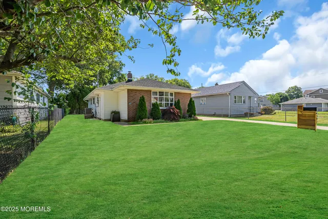 a view of house with garden