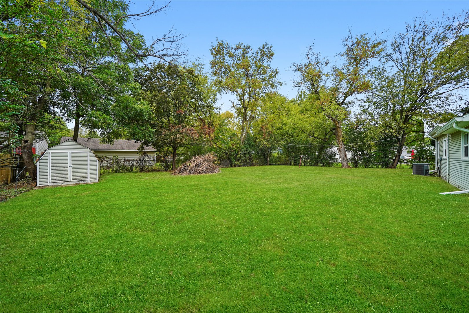 37936 North Wilson Avenue Beach Park, IL 60087 - Photo 15 of 16 a view of green field with trees in the background