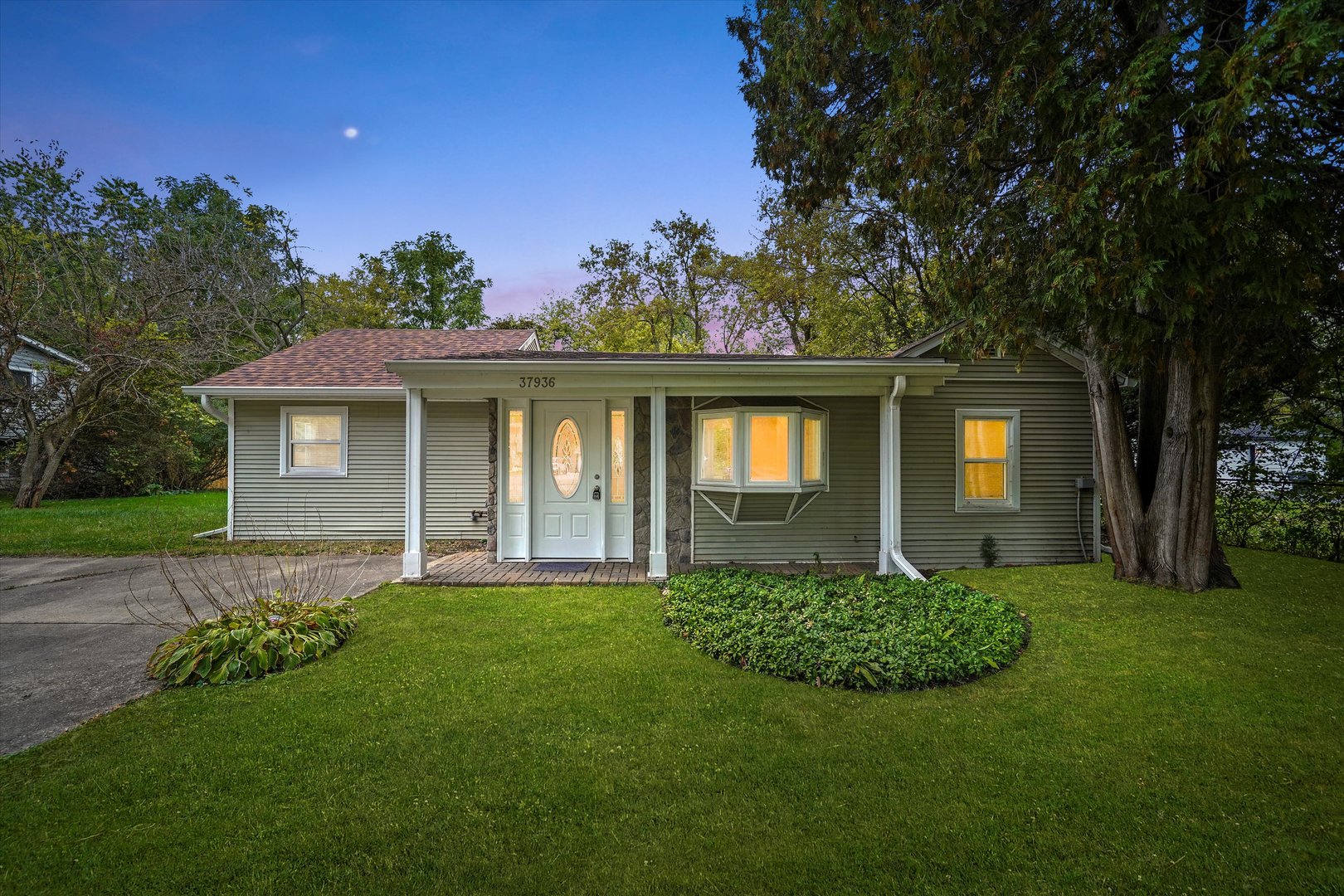 37936 North Wilson Avenue Beach Park, IL 60087 - Photo 16 of 16 a front view of a house with a yard