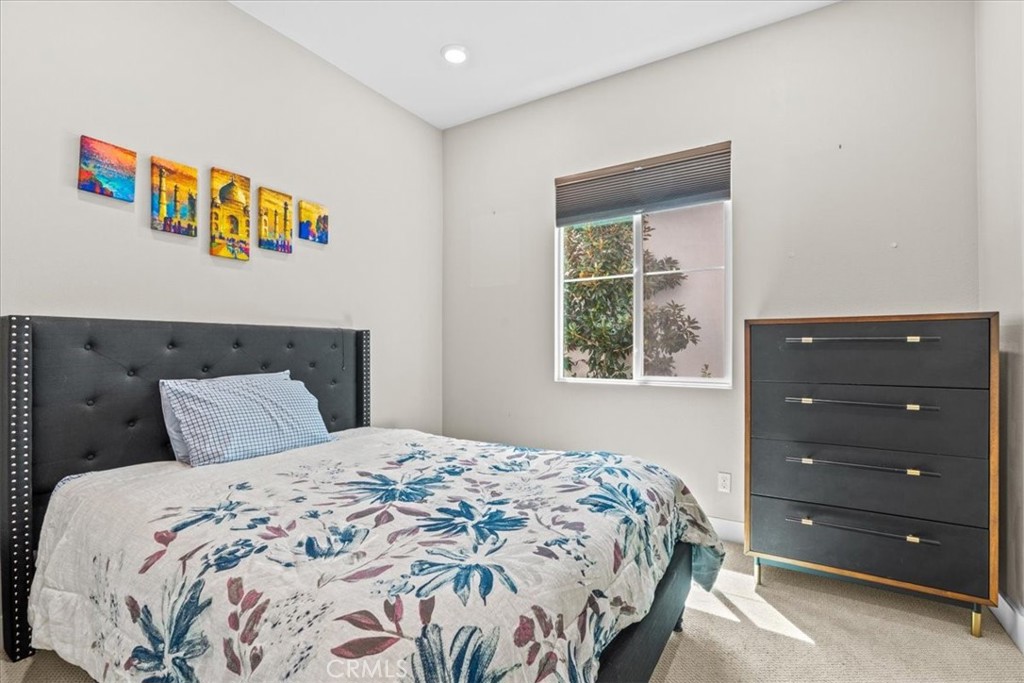113 Source Irvine, CA 92618 - Photo 16 of 39 a bedroom with a bed and a window