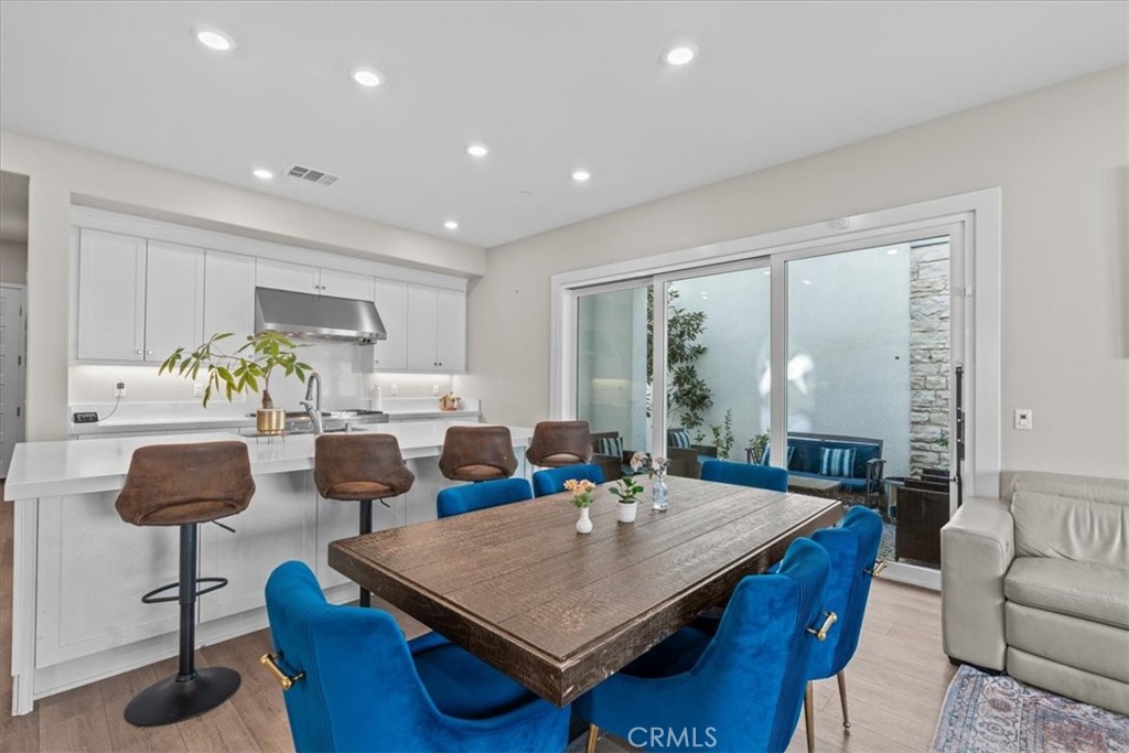 113 Source Irvine, CA 92618 - Photo 9 of 39 a living room with furniture and a large window