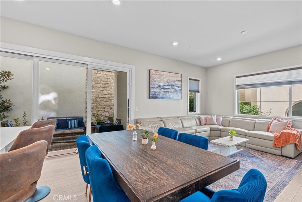 113 Source Irvine, CA 92618 - Photo 10 of 39 a living room with furniture and a large window
