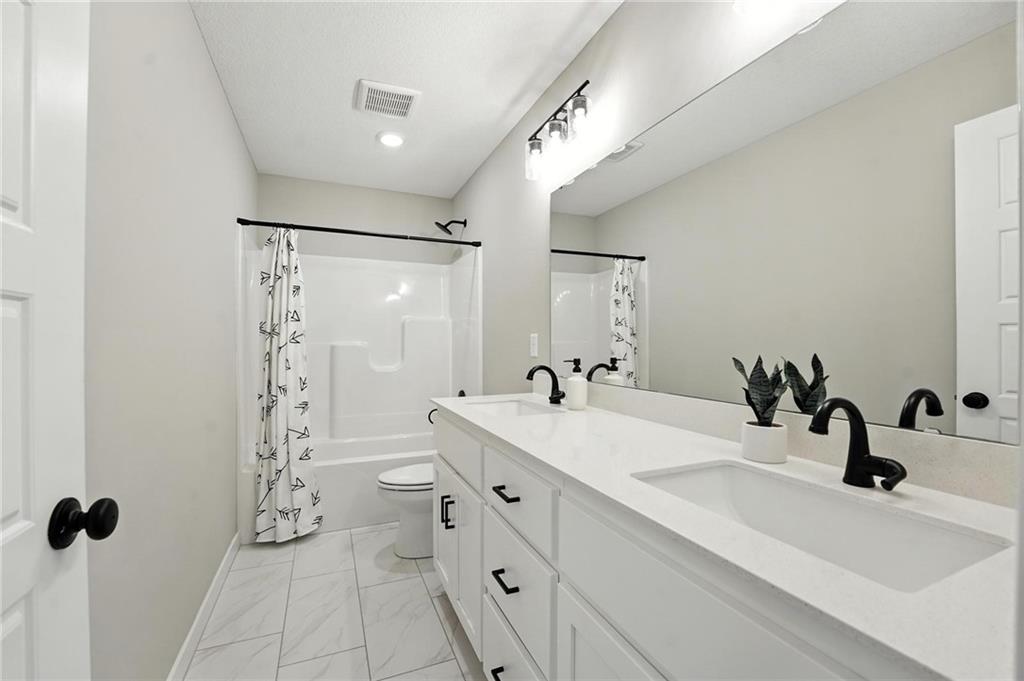 902 Southwest Bluebird Lane Oak Grove, MO 64075 - Photo 19 of 25