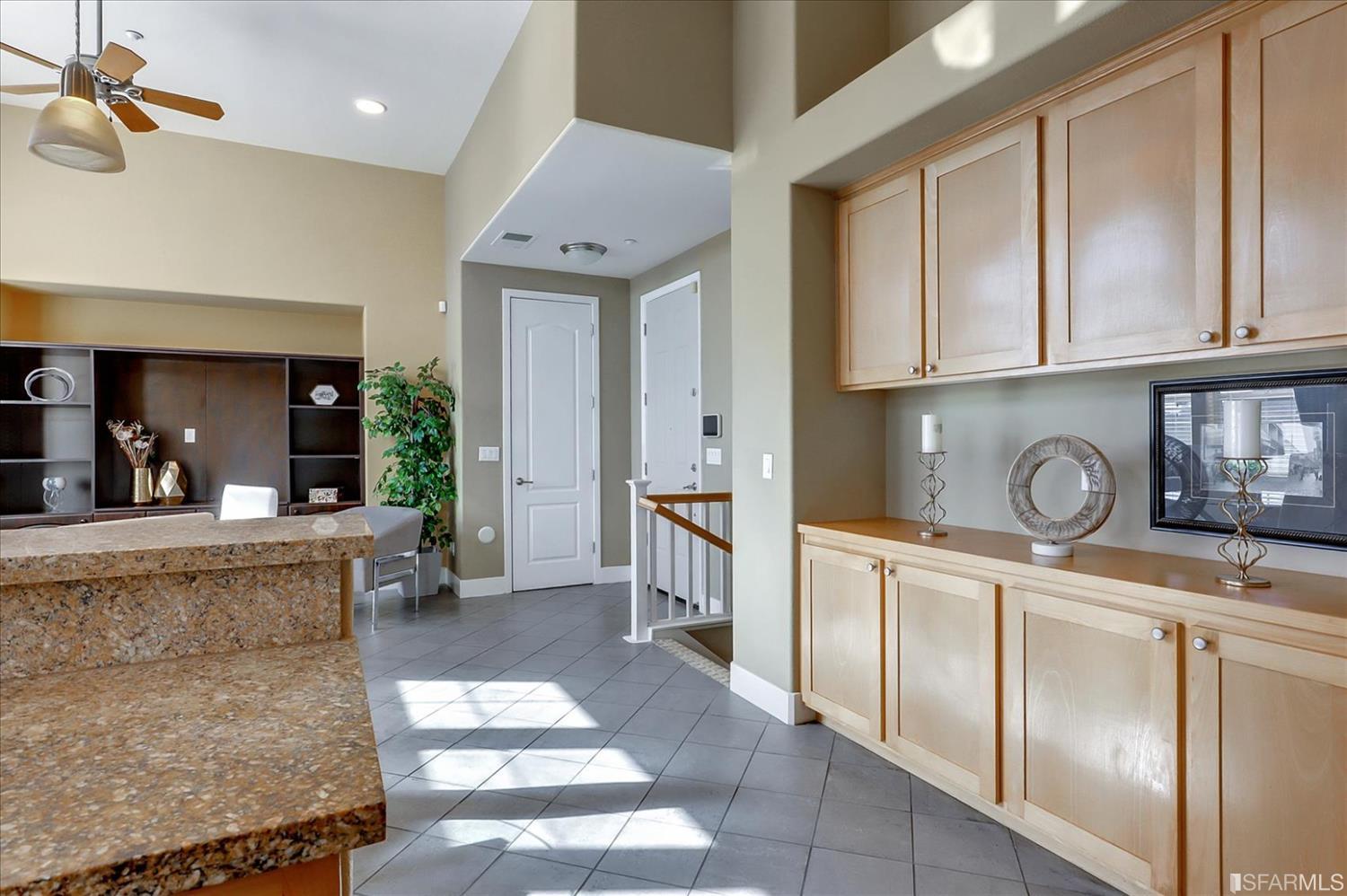 6010 Old Quarry Loop Oakland, CA 94605 - Photo 15 of 32 a living room with granite countertop furniture and a fireplace
