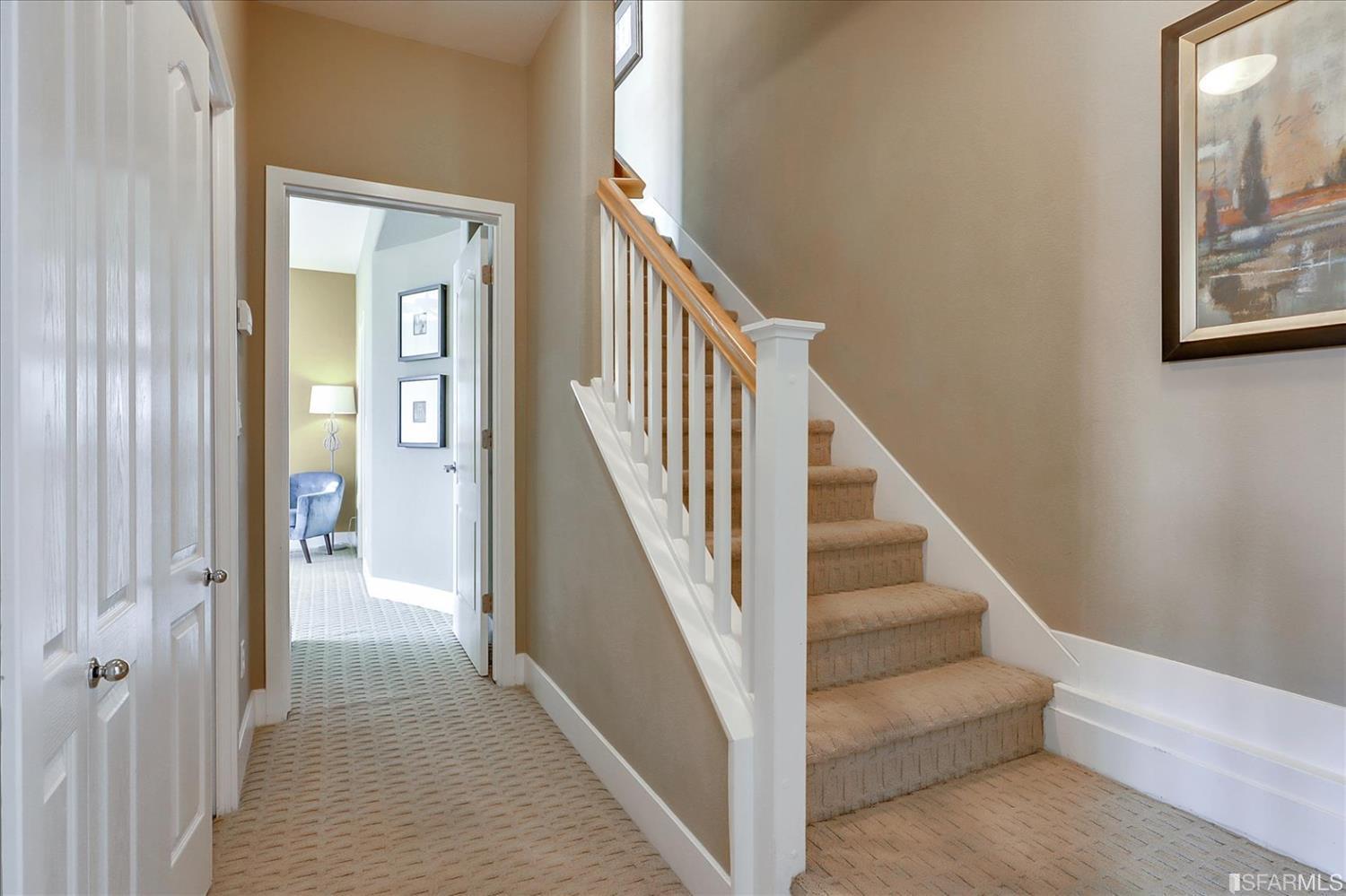 6010 Old Quarry Loop Oakland, CA 94605 - Photo 20 of 32 a view of a hallway with wooden floor and entryway