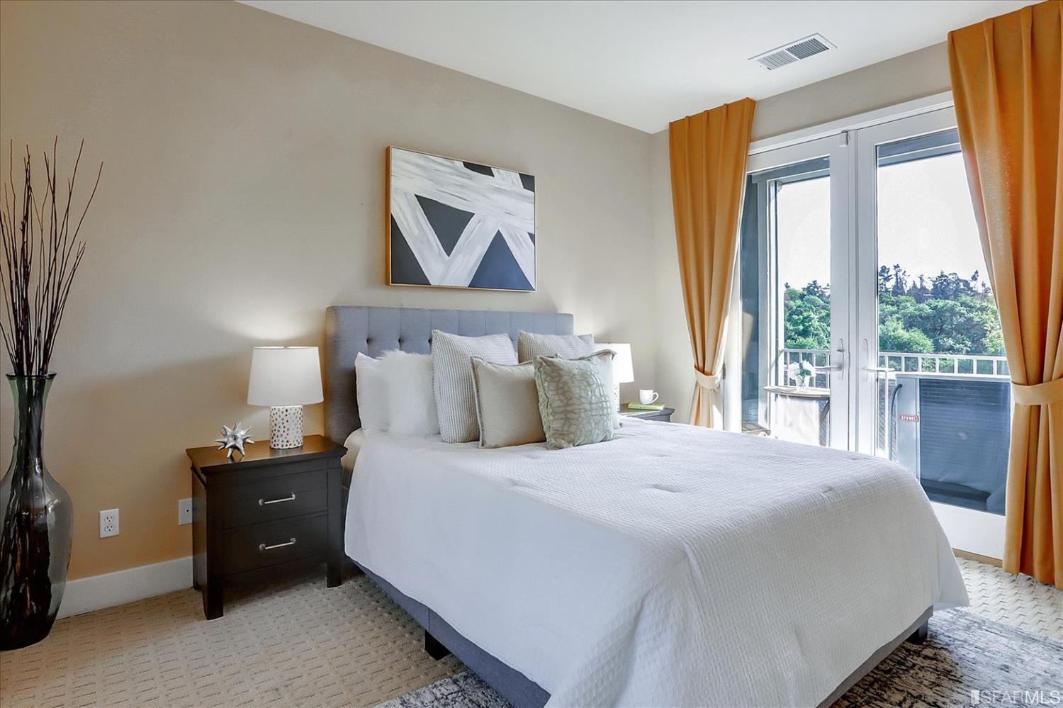 6010 Old Quarry Loop Oakland, CA 94605 - Photo 24 of 32 a bedroom with a bed and a window